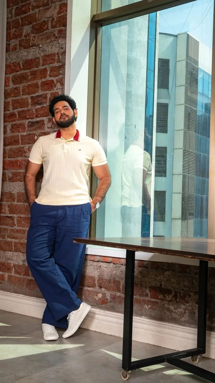 Alii Khan in a candid vertical photograph
