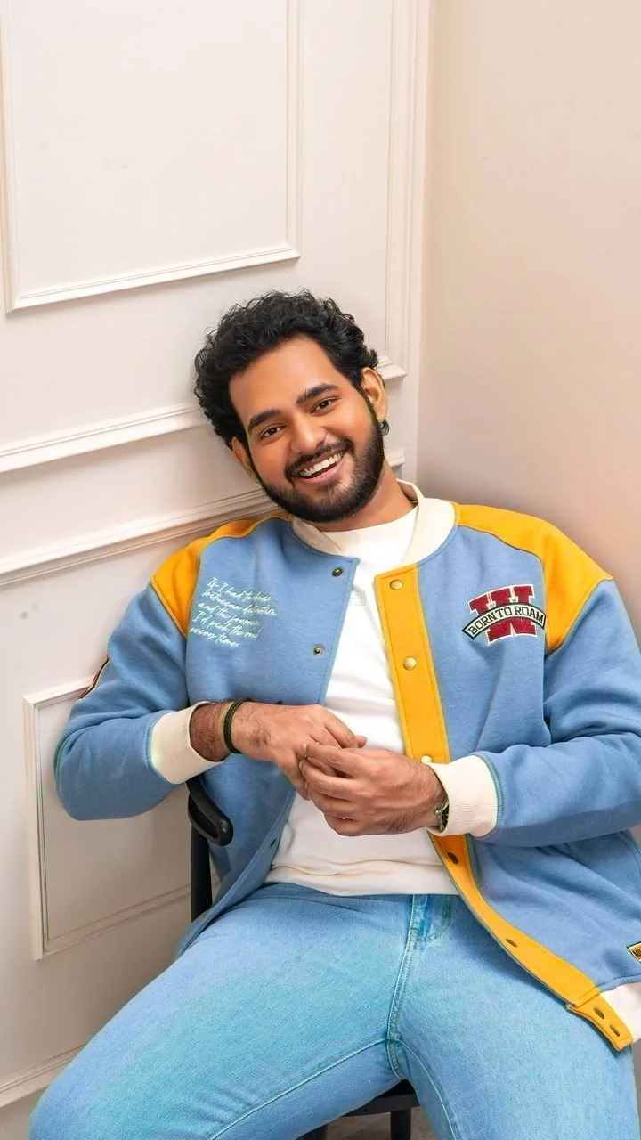 Alii Khan in a candid vertical photograph