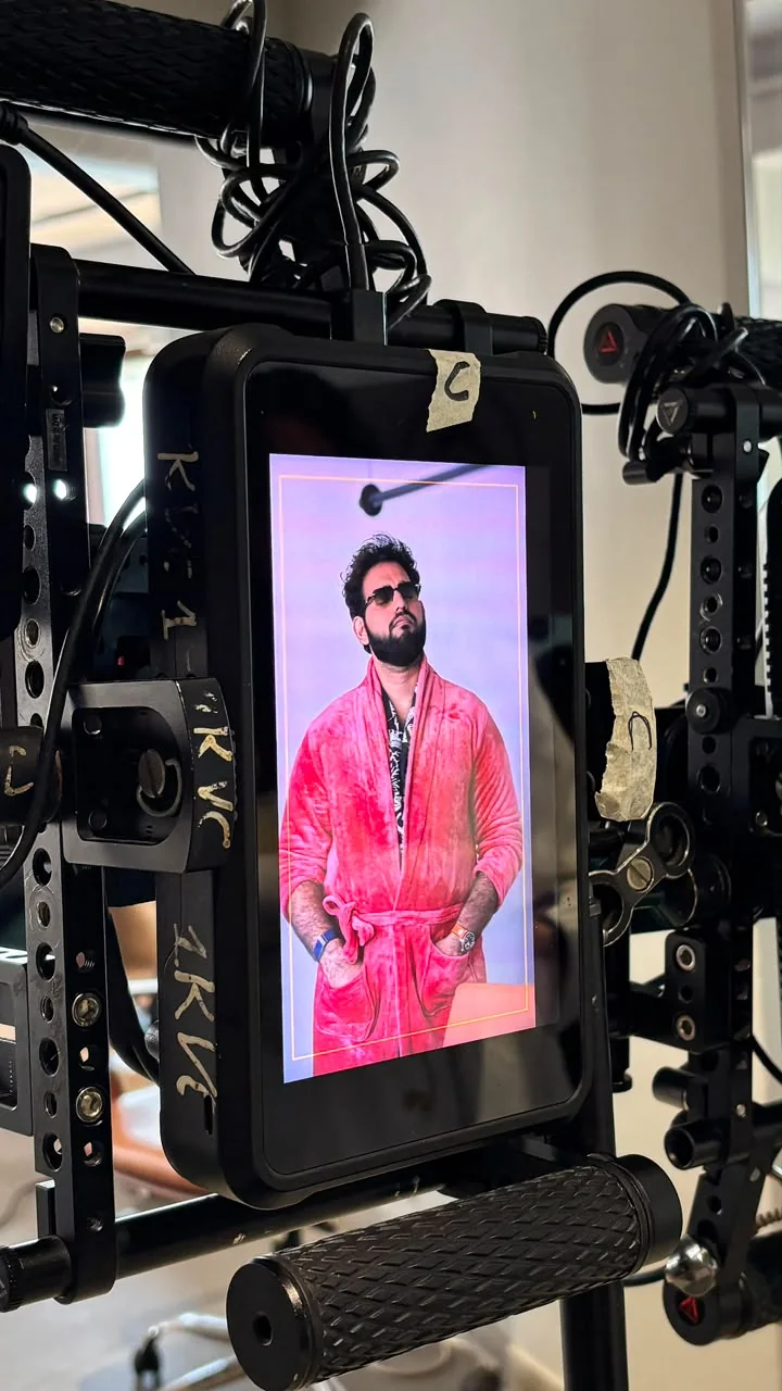Alii Khan in a candid vertical photograph