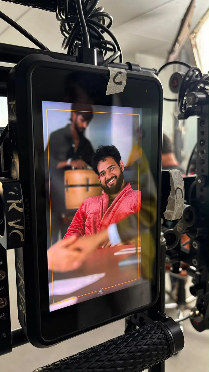 Alii Khan in a candid vertical photograph