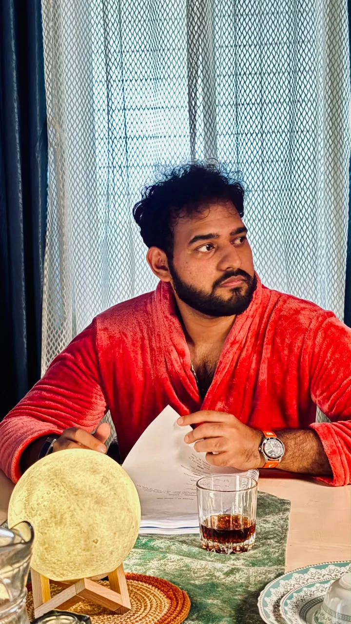 Alii Khan in a candid vertical photograph