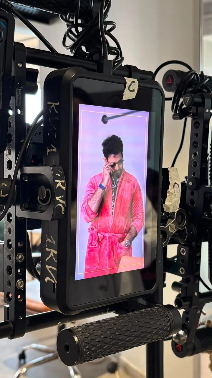 Alii Khan in a candid vertical photograph